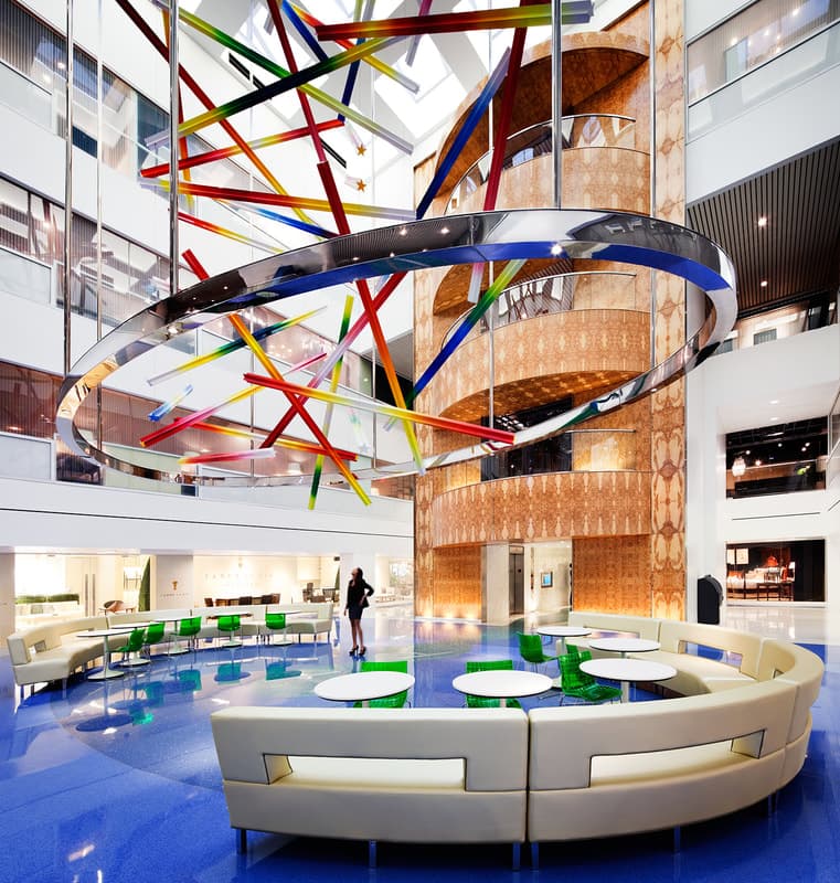 Sky-lit atrium with sculptural ceiling and daylight